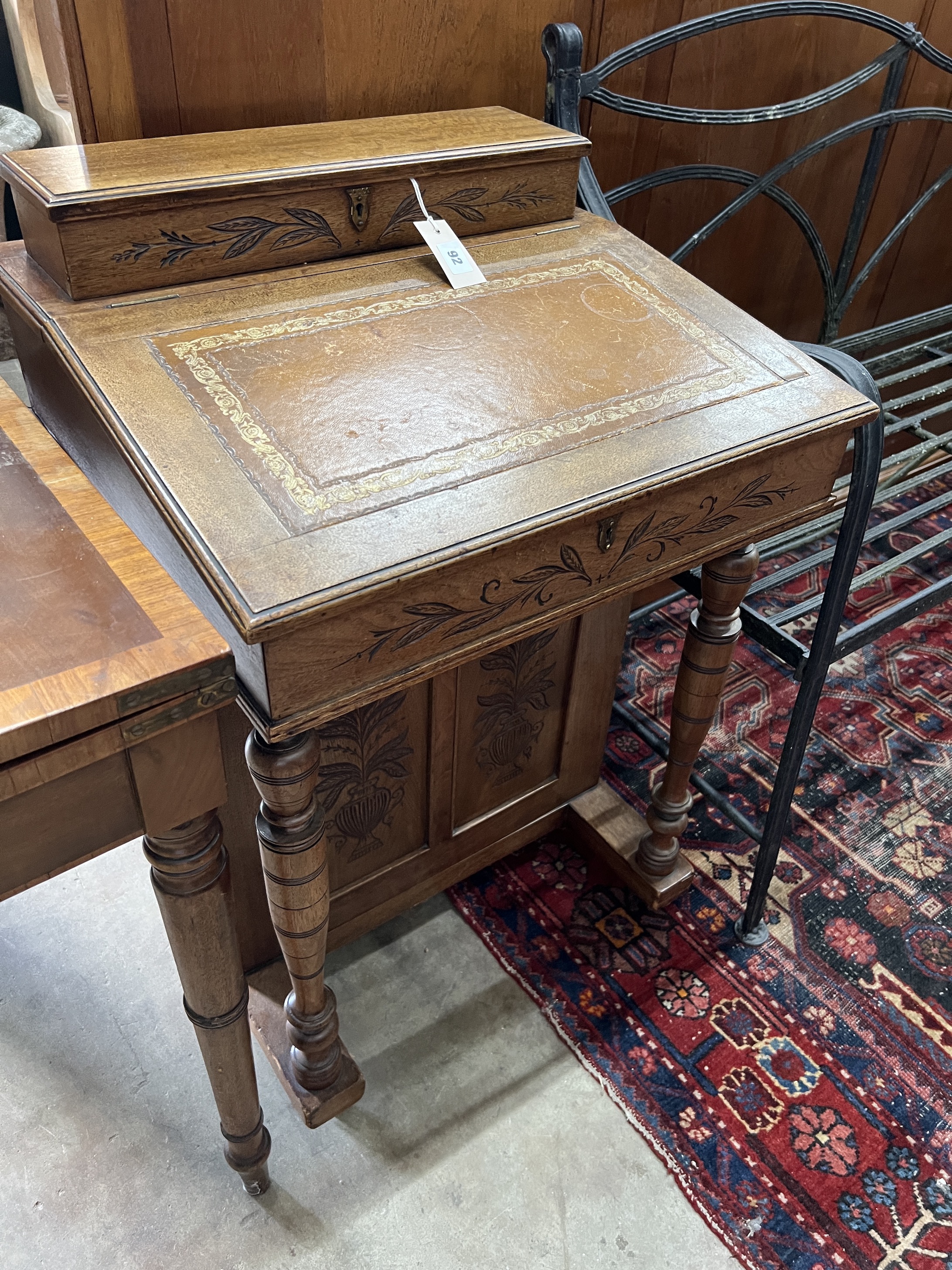 A late Victorian mahogany Davenport, width 56cm, depth 52cm, height 84cm